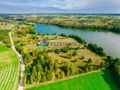 Malownicza działka z linią brzegową jeziora - zdjęcie 4