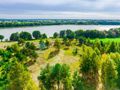 Malownicza działka z linią brzegową jeziora - zdjęcie 2
